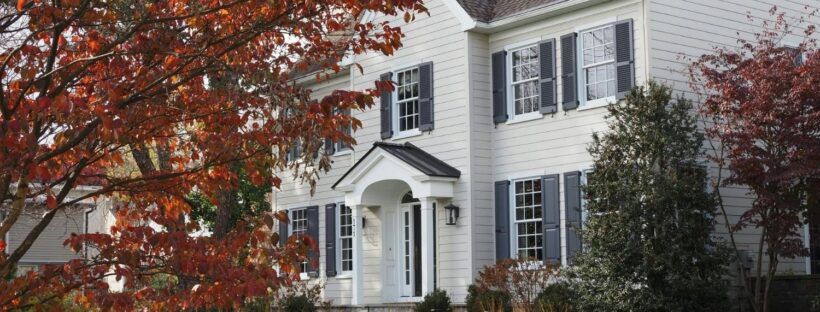 New England home with fall leaves