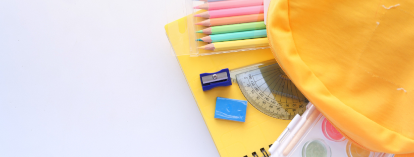 Yellow backpack filled with school supplies