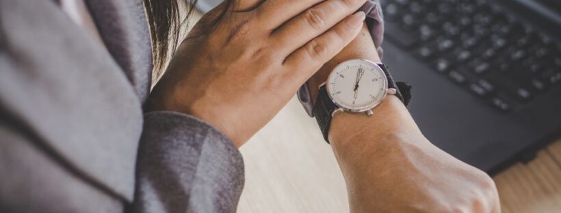 Woman looking at watch